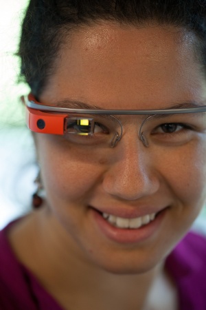 A woman with Google Glass on.